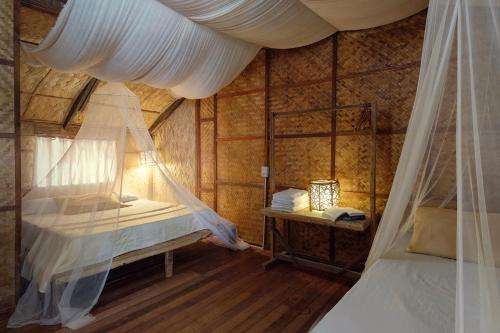 www.amamibeachresort.com
