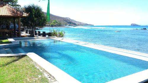 www.amartabeachcottages.com