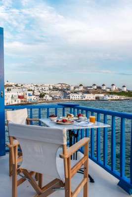 www.bluetopiamykonos.com