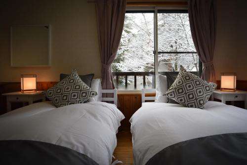 www.shelteredinnhakuba.com