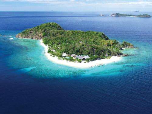 www.clubparadisepalawan.com