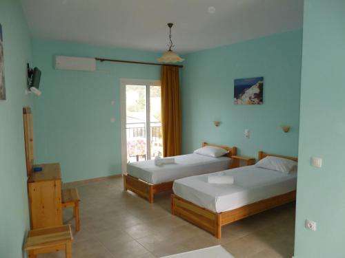 www.alexandrosguesthouse.com