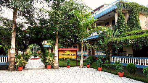 www.chitwanvillageresort.com
