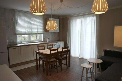 www.apartamentyprzywinnicy.pl