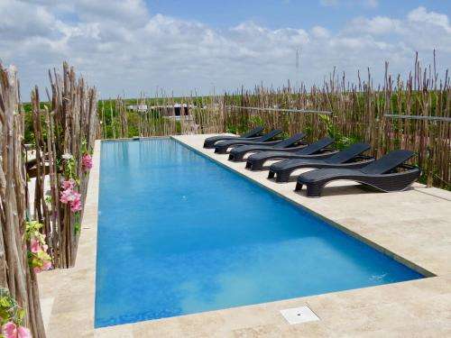 www.hotelcarpediemtulum.com