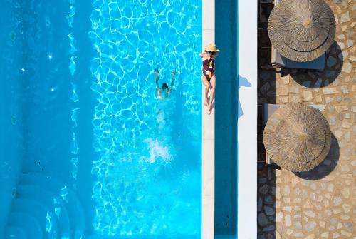 www.emgardsuites.gr