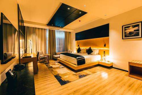 www.blackwoodaparthotel.co.tz