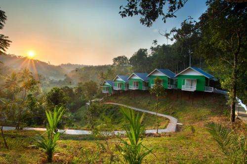www.arbourresortmunnar.com