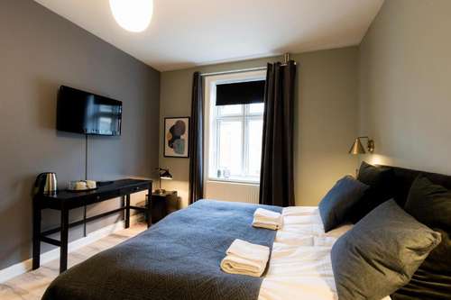 www.postgaardenhotel.dk