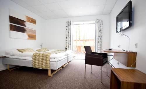 www.hotelthinggaard.dk