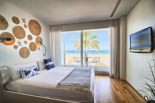 www.merakibeachhotel.com