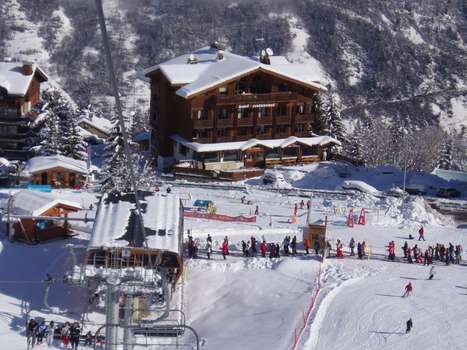 www.courchevel-hotel-flocons.com