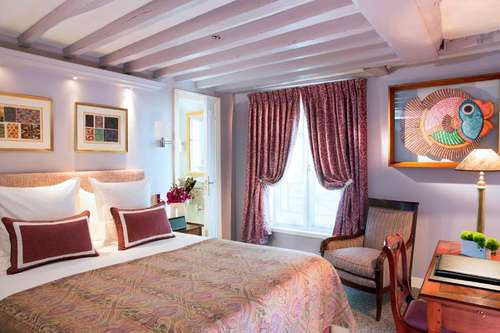 www.hotel-relais-des-halles.com