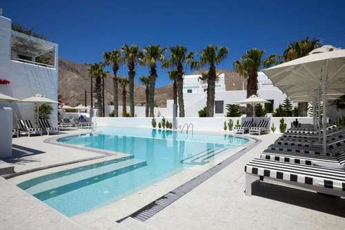 www.kourosvillagehotel.com