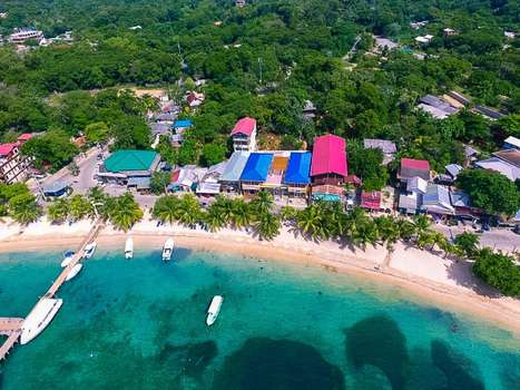 www.mrtucanhotelroatan.com