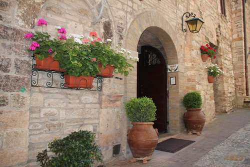 www.hotelpaxassisi.com