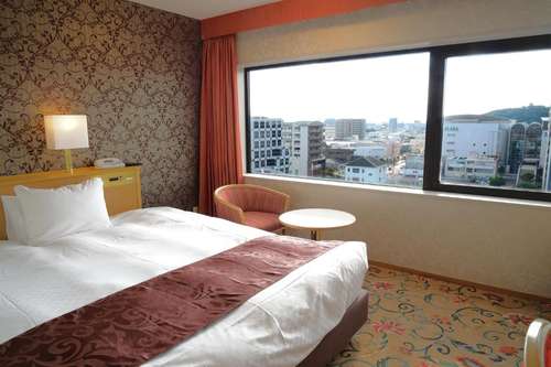 www.mei-komakihotel.co.jp