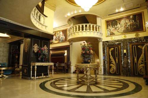 www.queenssuitehotel.com