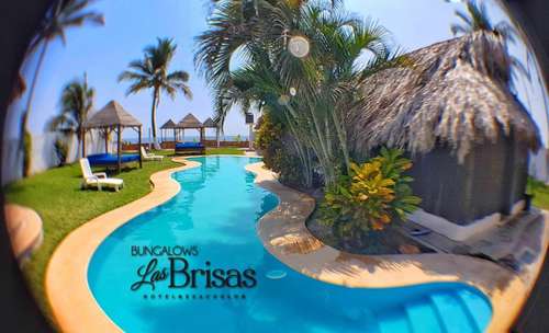 www.bungalowslasbrisas.com