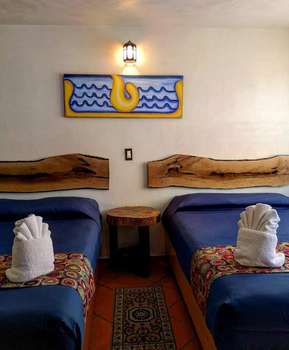 www.hoteltlatoani.com