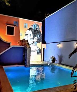 www.hotelcasadelasflores.com.mx