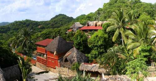 www.villaescondida2002.com