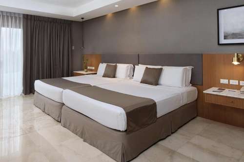 www.citygardensuites.com