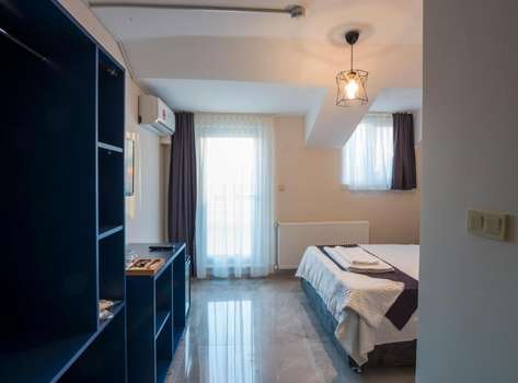 www.minisuiteotel.com