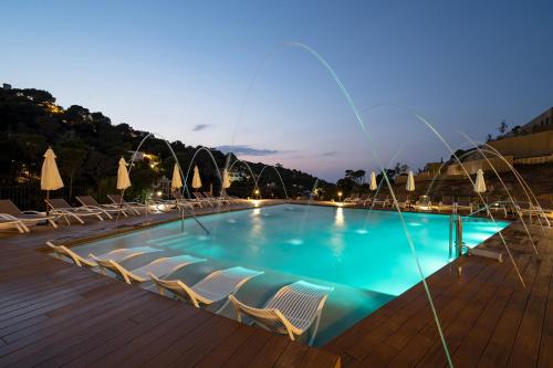 www.talaiaplazaecoresort.com