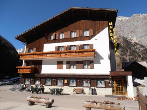 www.hotelmarmolada.com