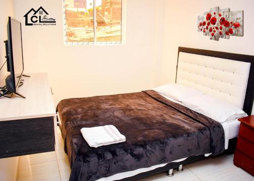 www.apartahotelsanjuandellago.com