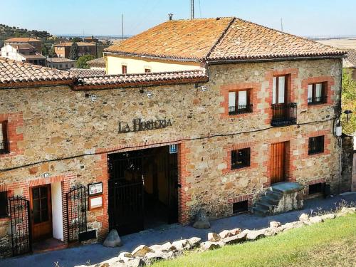 www.lahosteriadeoropesa.com