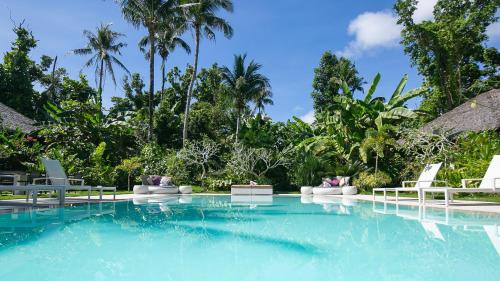 www.kawayanvillasiargao.com