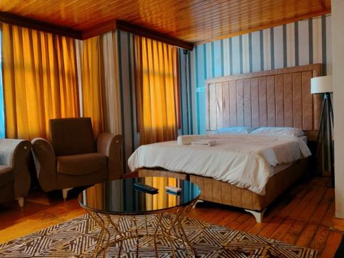 www.kaizenhotel.rw