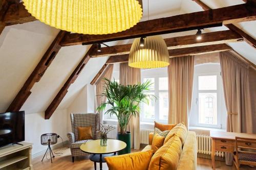 www.apartamentypocztowe.pl