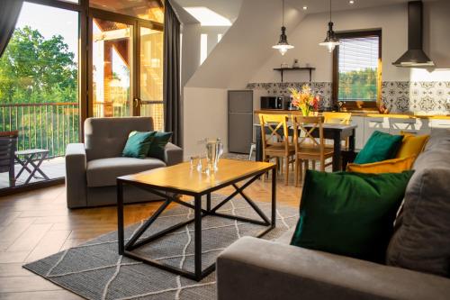 www.apartamentypodkominkiem.pl
