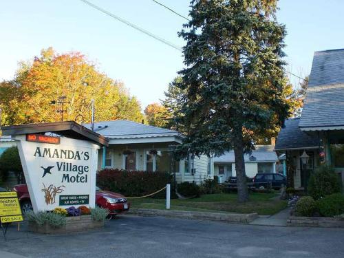 www.amandasvillagemotel.com