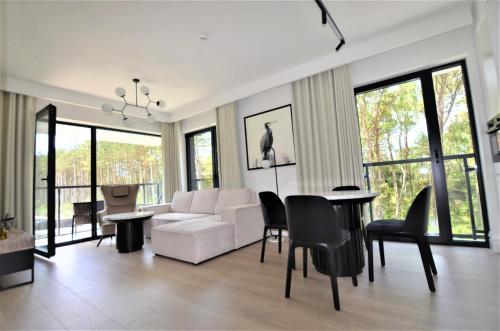 www.apartamentyrogowo.com