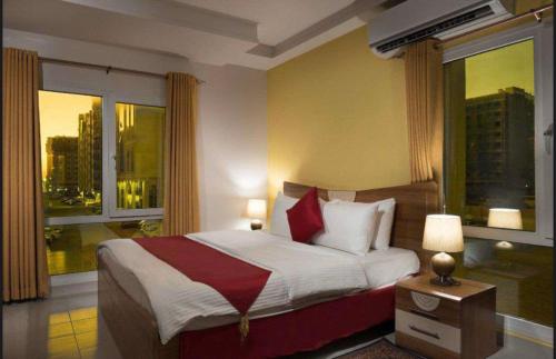 www.almanafhotelsuites.com