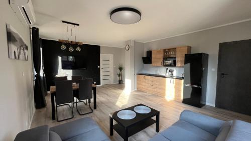 www.apartamentyczarnaperla.pl