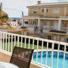 Townhouse with terraces and communal pool