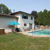 Home in suburban neighborhood with POOL\HOT TUB