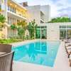Serene Beachside Condos Pool Onsite Walk to Ocean!