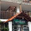 RIVERSIDE Inn & Suits