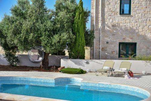 www.villasbeachfront.gr