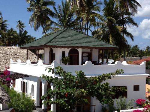 www.mwendawima-villa.com