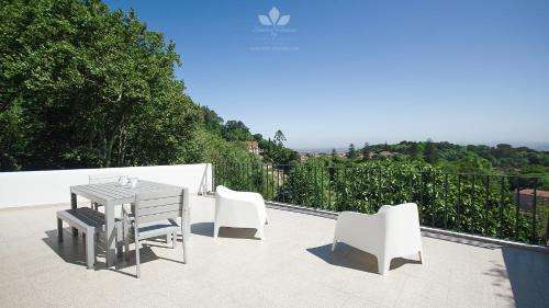 www.sintrahouses.com