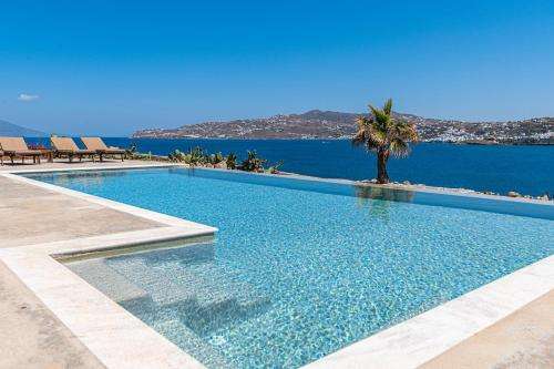 www.carpediemvillasmykonos.com