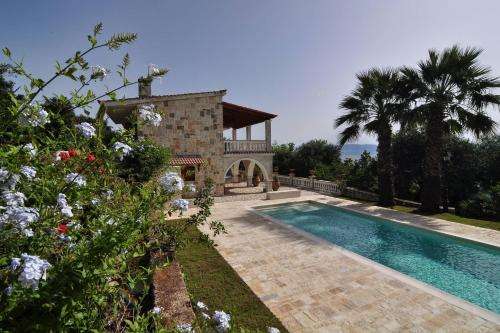 www.ioniangardenvillas.gr