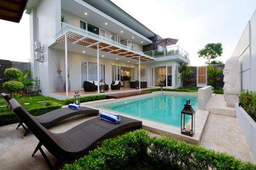 www.villaarushajogja.com